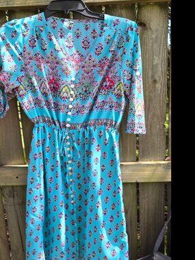 Summer Maxi Dress with graphic print, in summer colors.  V-neck and slit skirt